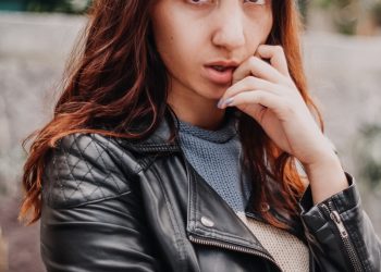 woman in black leather jacket