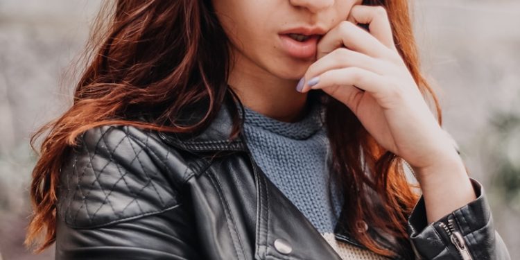 woman in black leather jacket